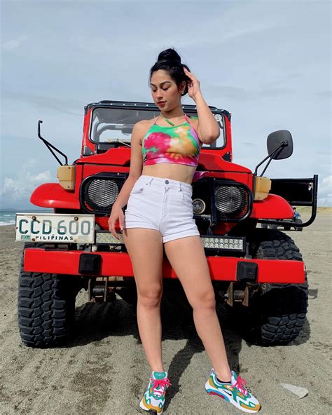 Pinay celebrities wearing Dior swimsuits .